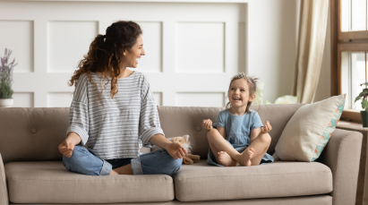 A picture of mother & daughter laughing.