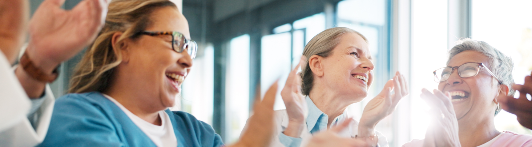 People clapping in celebration